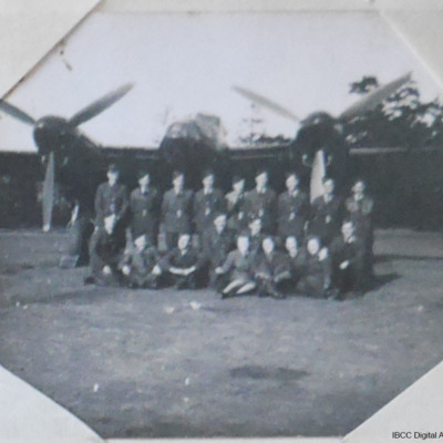 Nineteen personnel in front of a Mosquito